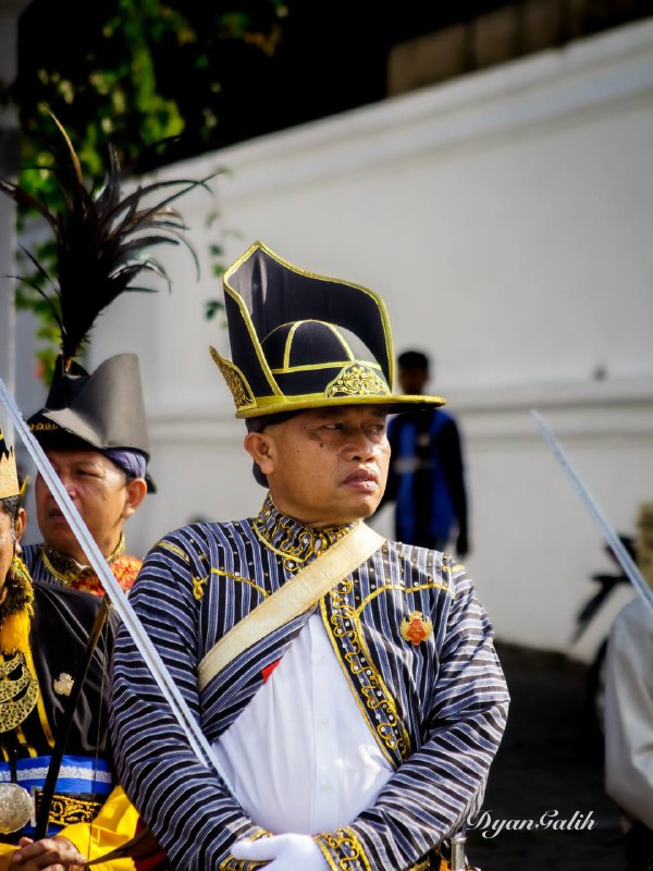 A man wearing a traditional soldier form.